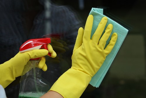 Cleaner handling a home cleaning visit in a SW18 property