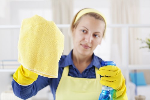 Technician preparing carpet cleaning equipment safely